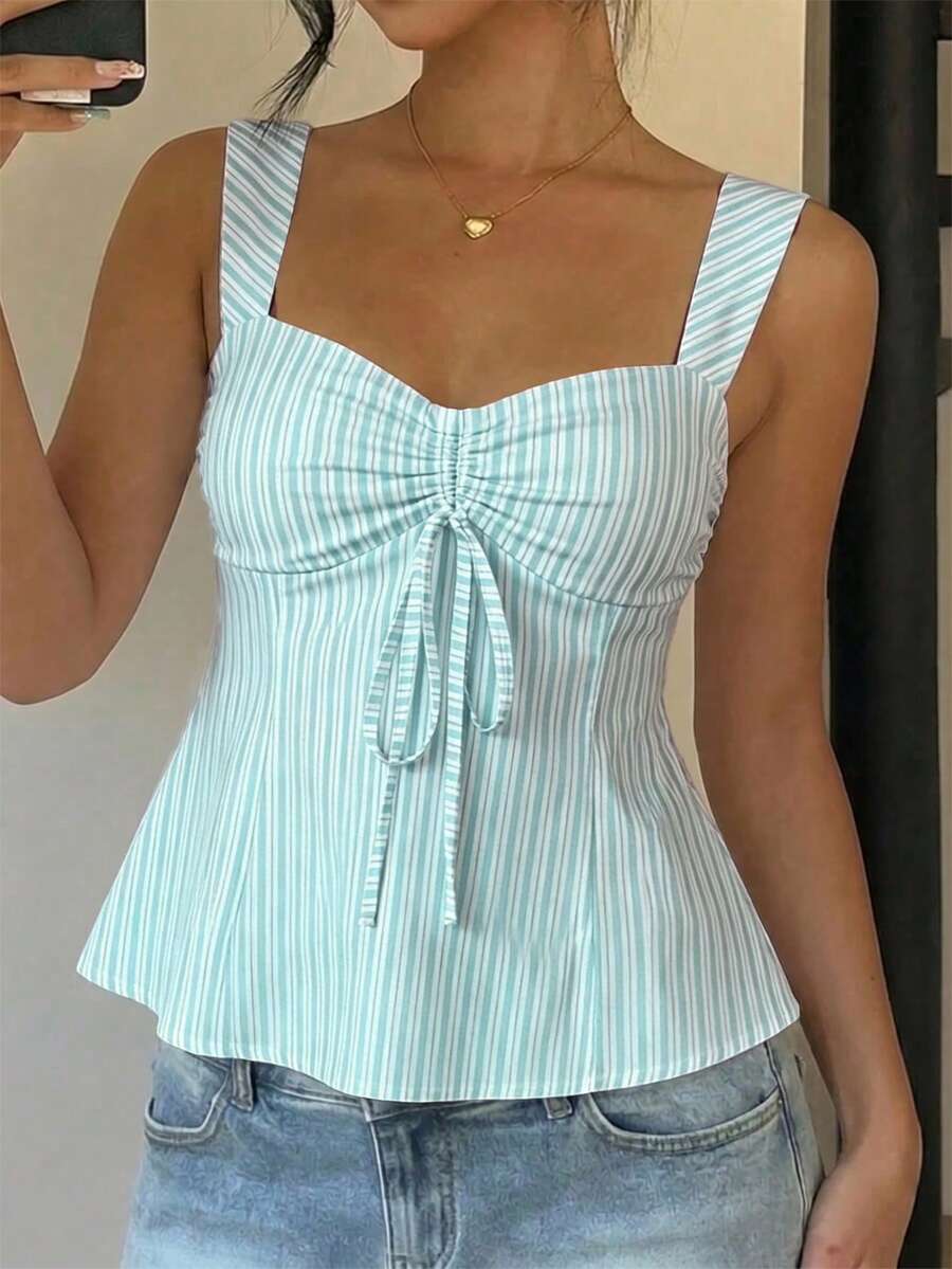 Women's striped camisole tank top with strap neckline, backless knot detail, cold shoulder styling, slim fit, and flared hem for casual vacation or daily wear.