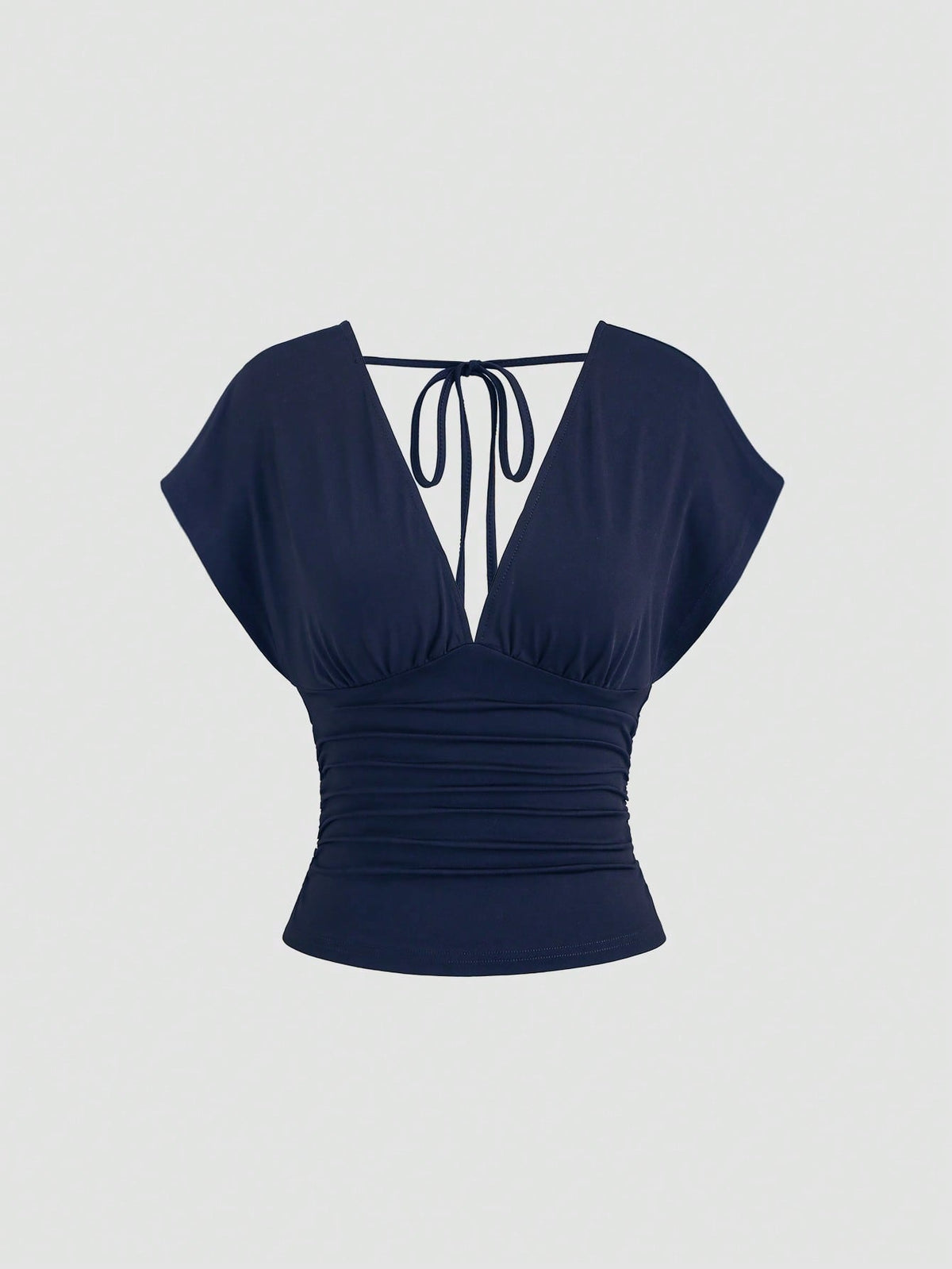 Women's black knitted t-shirt featuring a reversible deep v-neckline, batwing cap sleeves, ruched detailing, and a slim fit waist.