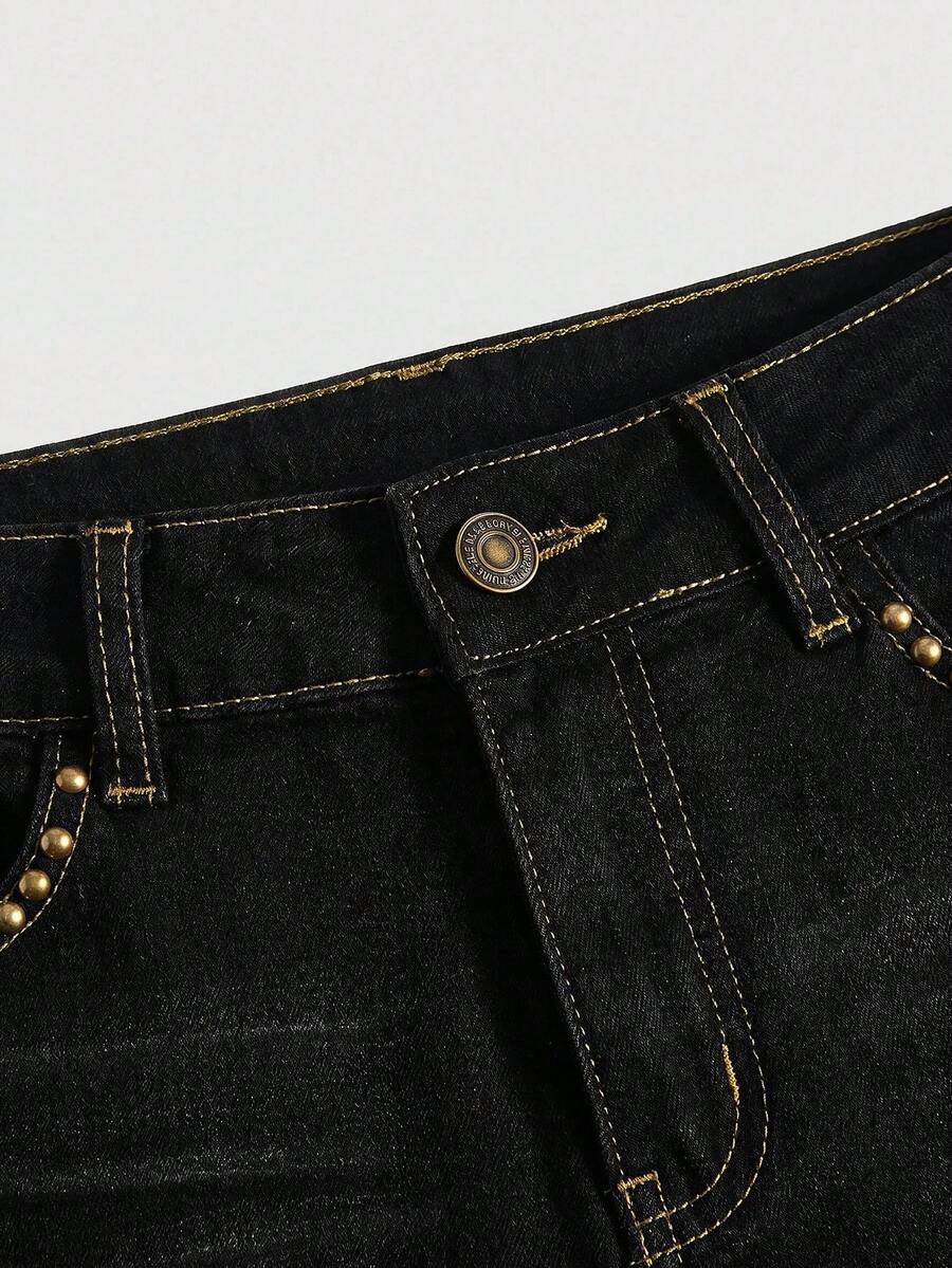 Women's Y2K low waist distressed shorts featuring butterfly studded details, pockets, and a zipper fly closure.