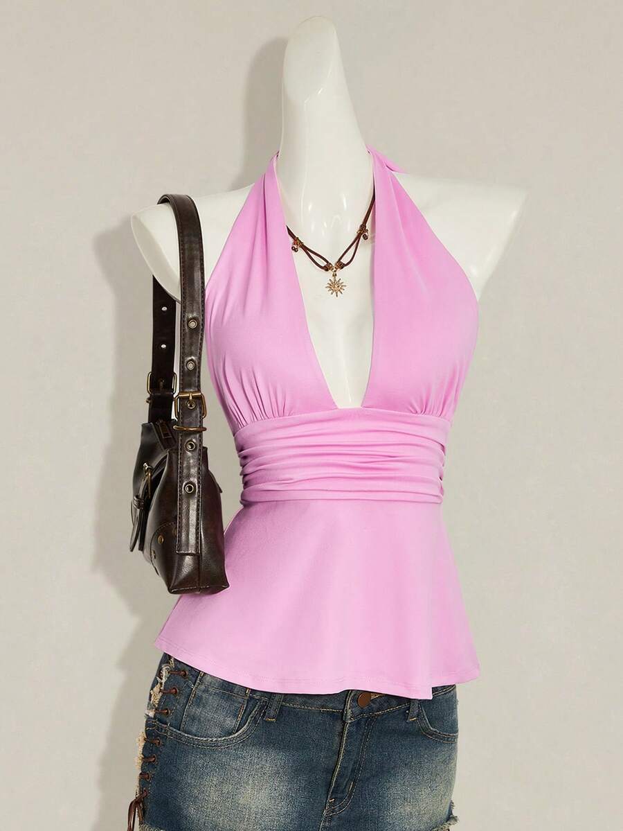 Women's backless halter babydoll tank top featuring a square neckline, slim fit silhouette, and a flared ruffle hem.