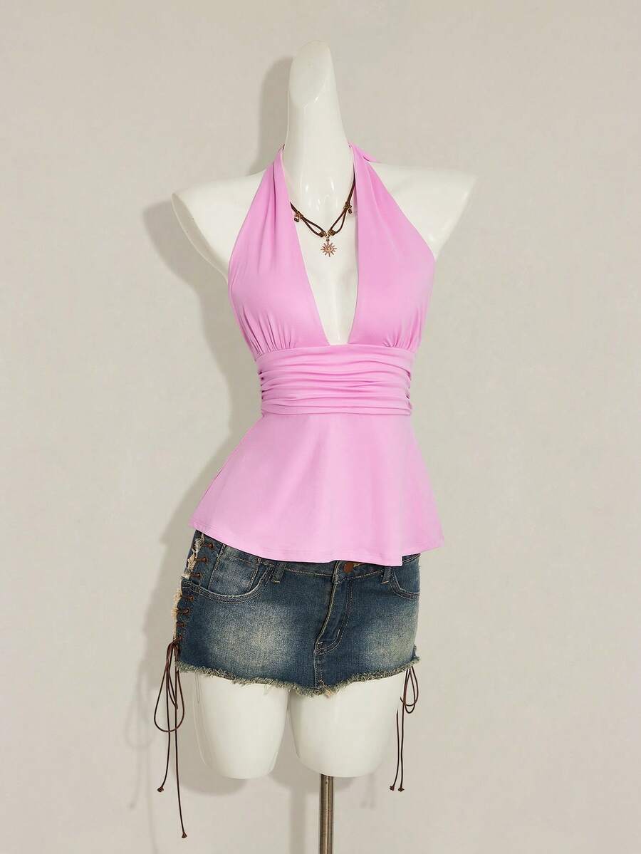 Women's backless halter babydoll tank top featuring a square neckline, slim fit silhouette, and a flared ruffle hem.