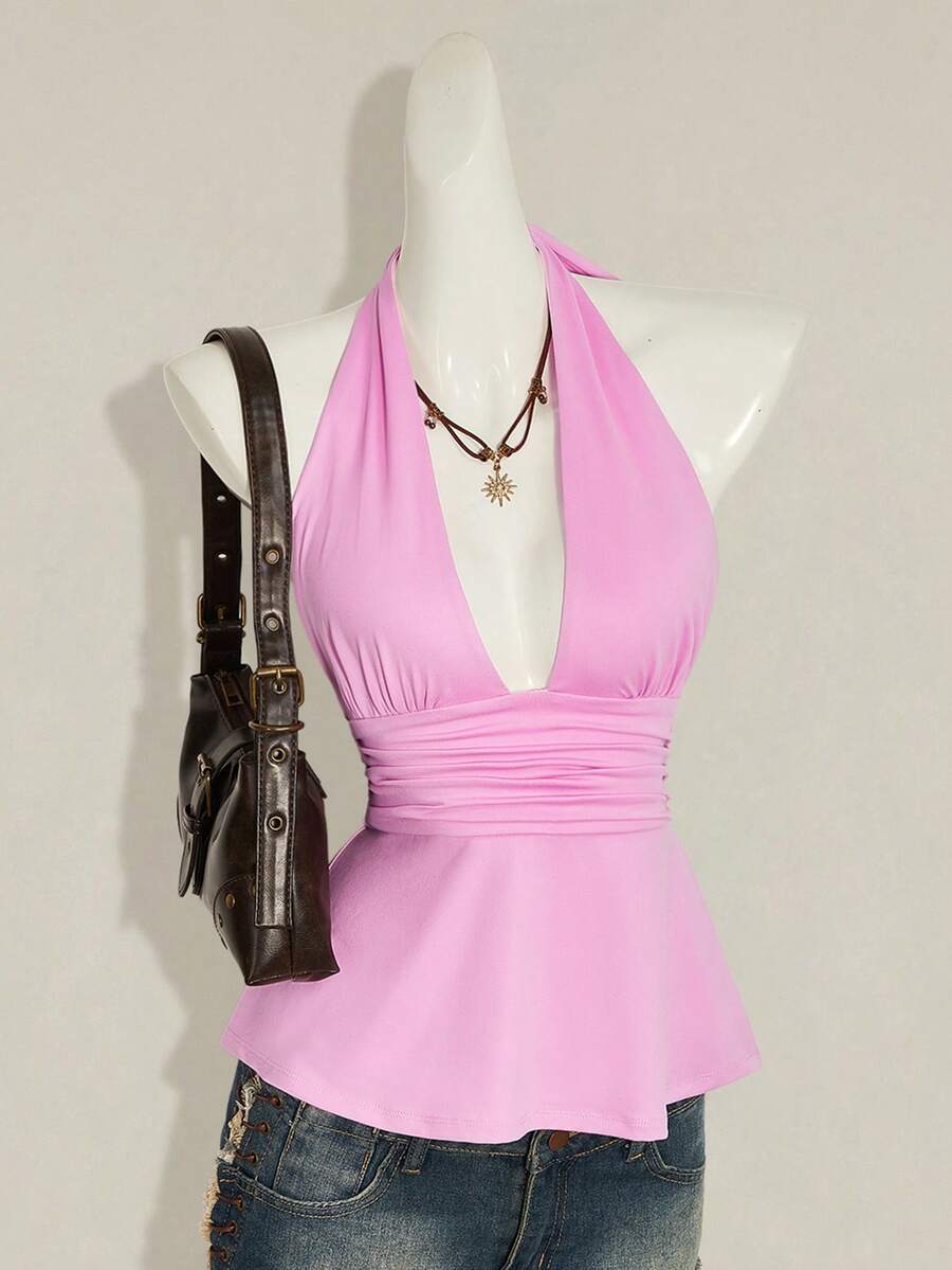Women's backless halter babydoll tank top featuring a square neckline, slim fit silhouette, and a flared ruffle hem.