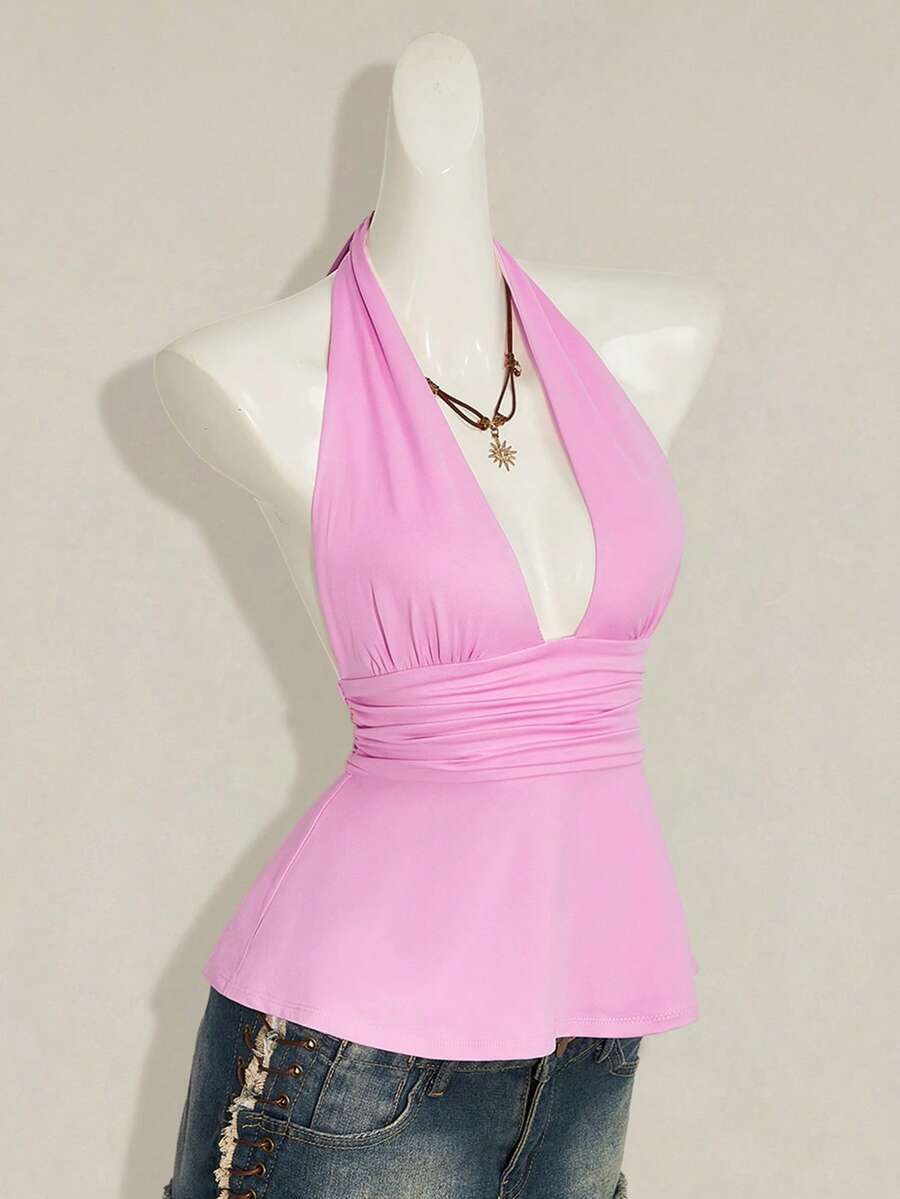 Women's backless halter babydoll tank top featuring a square neckline, slim fit silhouette, and a flared ruffle hem.