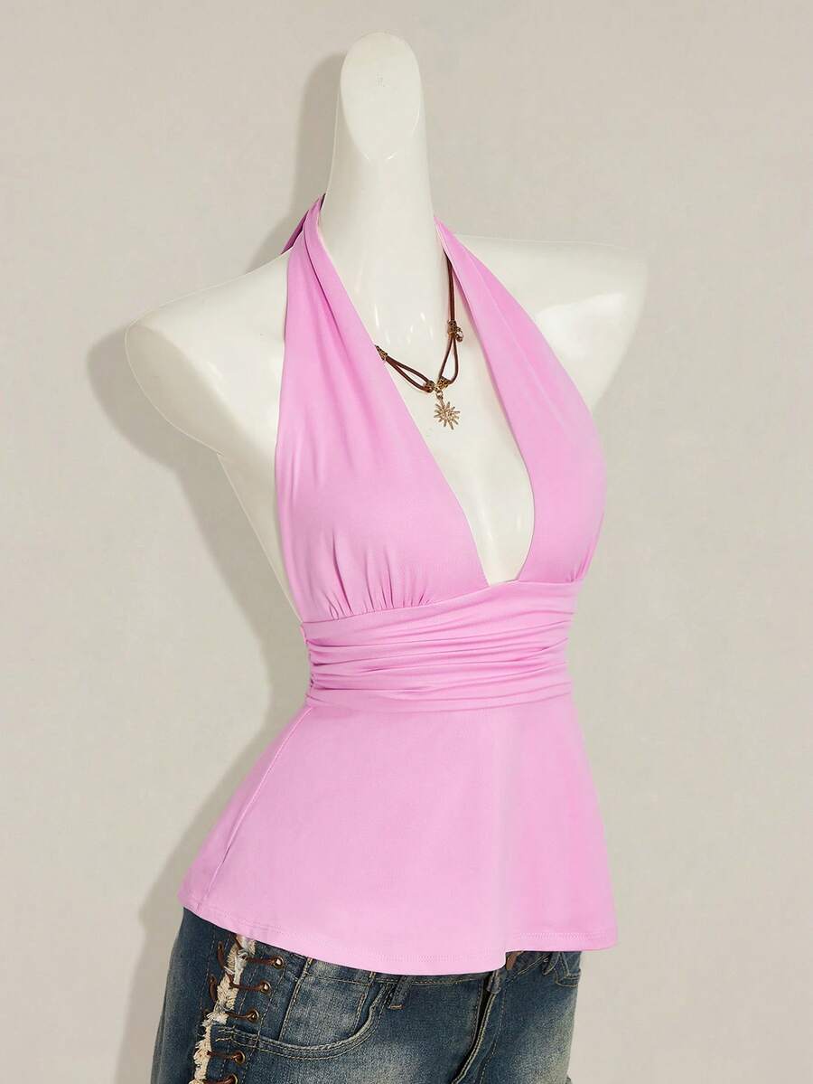 Women's backless halter babydoll tank top featuring a square neckline, slim fit silhouette, and a flared ruffle hem.