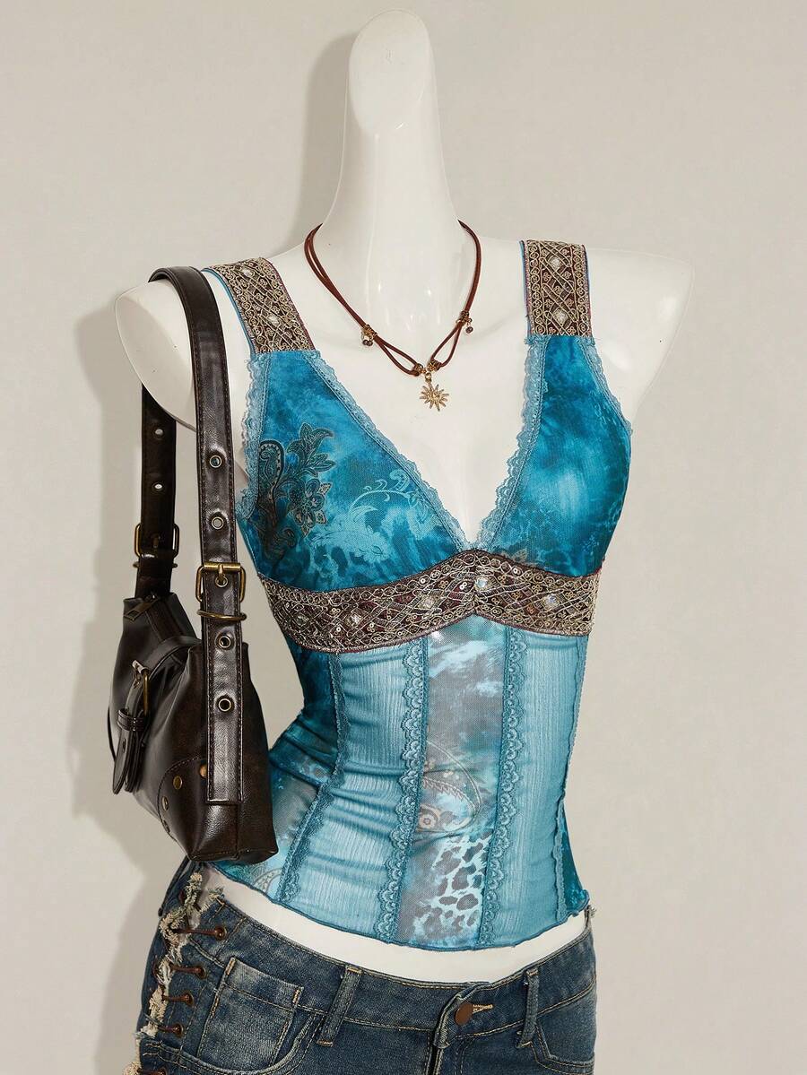 Women's Y2K fitted camisole with V-neckline, contrast lace patchwork, slim fit silhouette, backless design, and asymmetrical hem