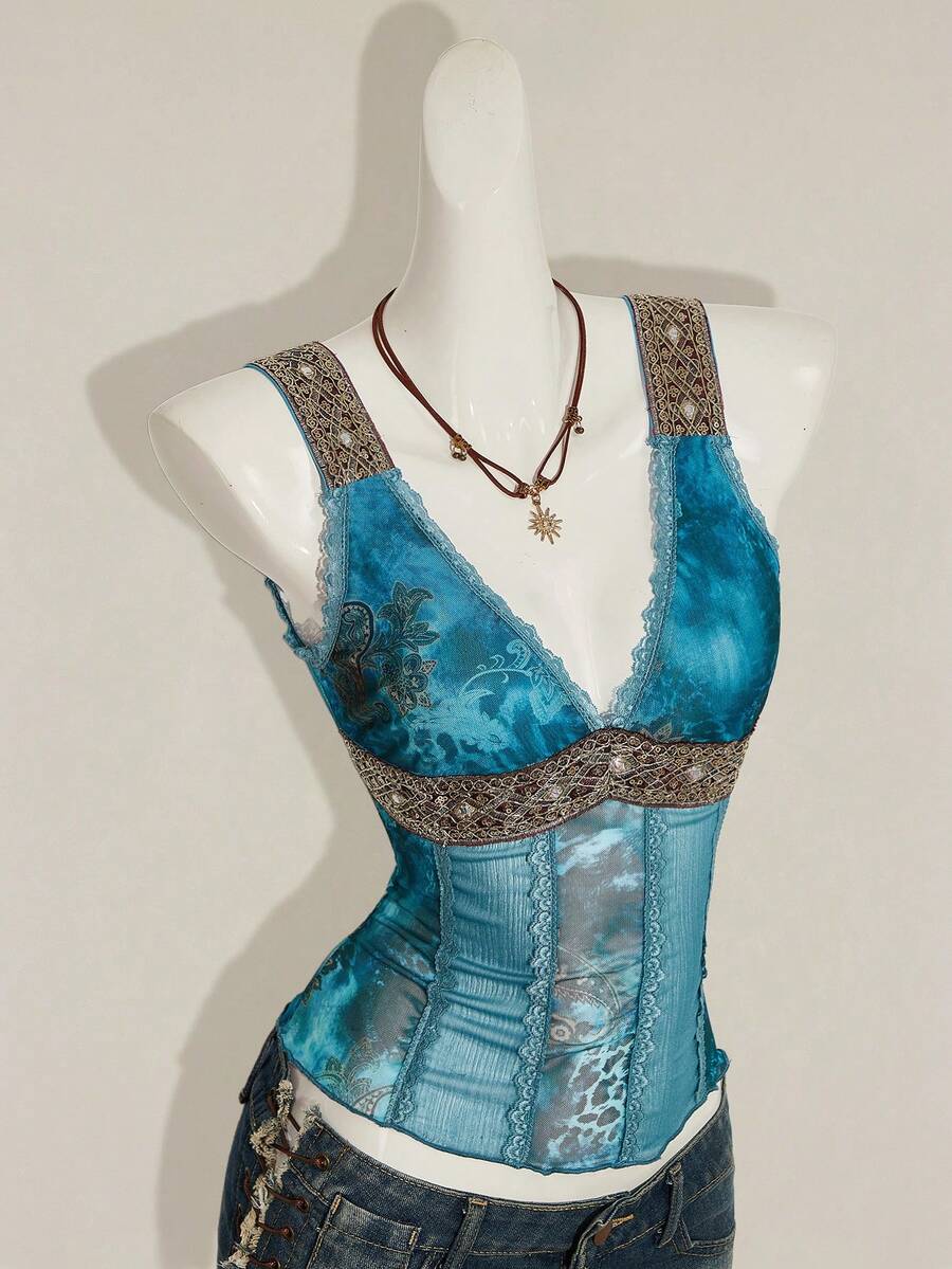 Women's Y2K fitted camisole with V-neckline, contrast lace patchwork, slim fit silhouette, backless design, and asymmetrical hem