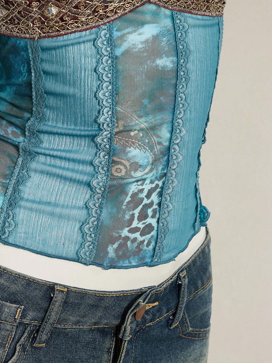 Women's Y2K fitted camisole with V-neckline, contrast lace patchwork, slim fit silhouette, backless design, and asymmetrical hem