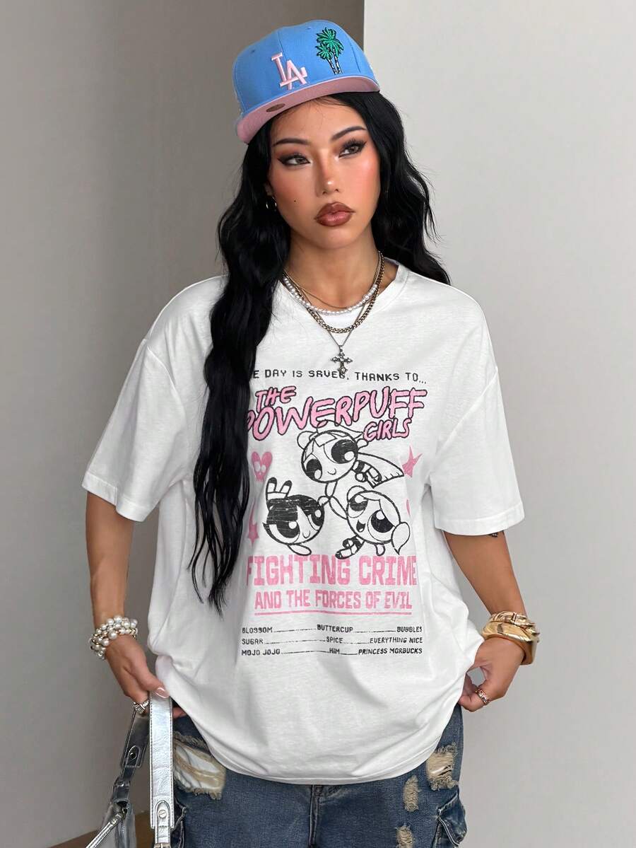Women's oversized graphic crew neck t-shirt made of 100% white cotton knitted fabric with drop shoulder half sleeves.