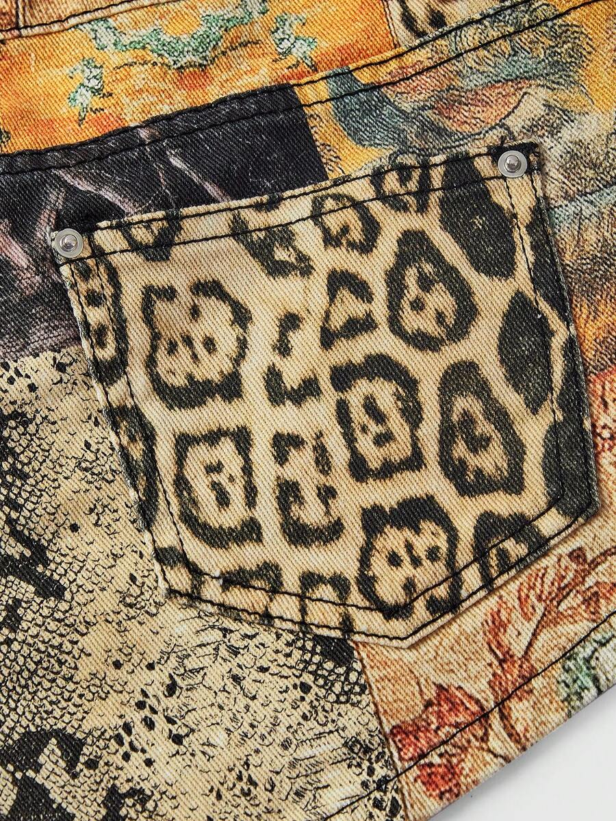 Vintage animal print ultra low waist mini shorts featuring button zipper closure, pockets, and regular fit.