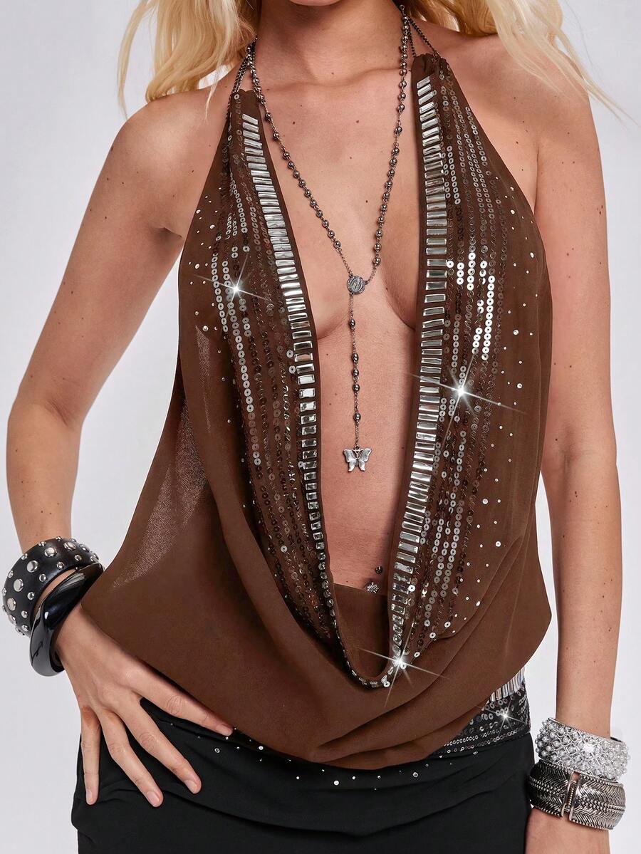 Women's draped neck backless halter crop tank top with studded details, letter pattern, semi-sheer chiffon fabric, and slim fit party style