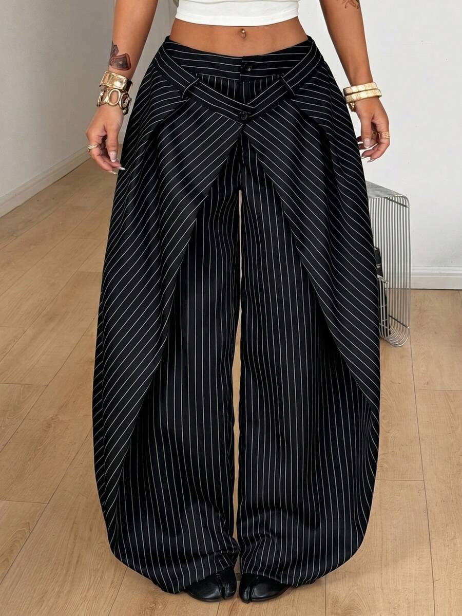 Women's loose fit pleated wide leg pants in royal blue pinstripe woven fabric with zipper fly closure.