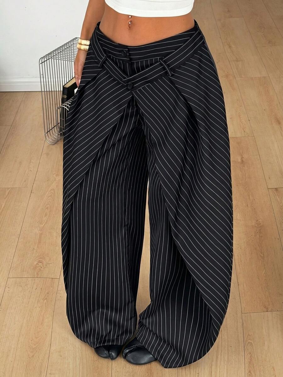 Women's loose fit pleated wide leg pants in royal blue pinstripe woven fabric with zipper fly closure.