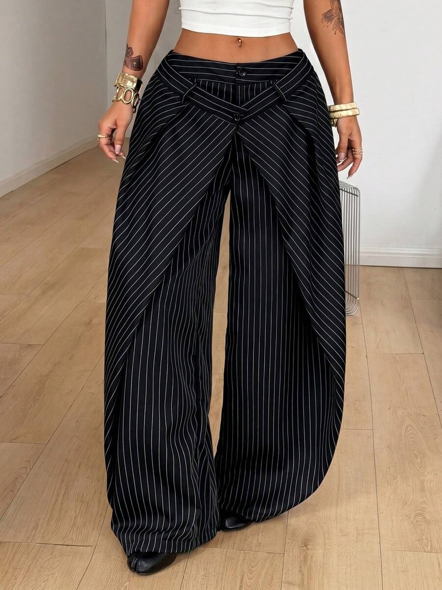 Women's loose fit pleated wide leg pants in royal blue pinstripe woven fabric with zipper fly closure.