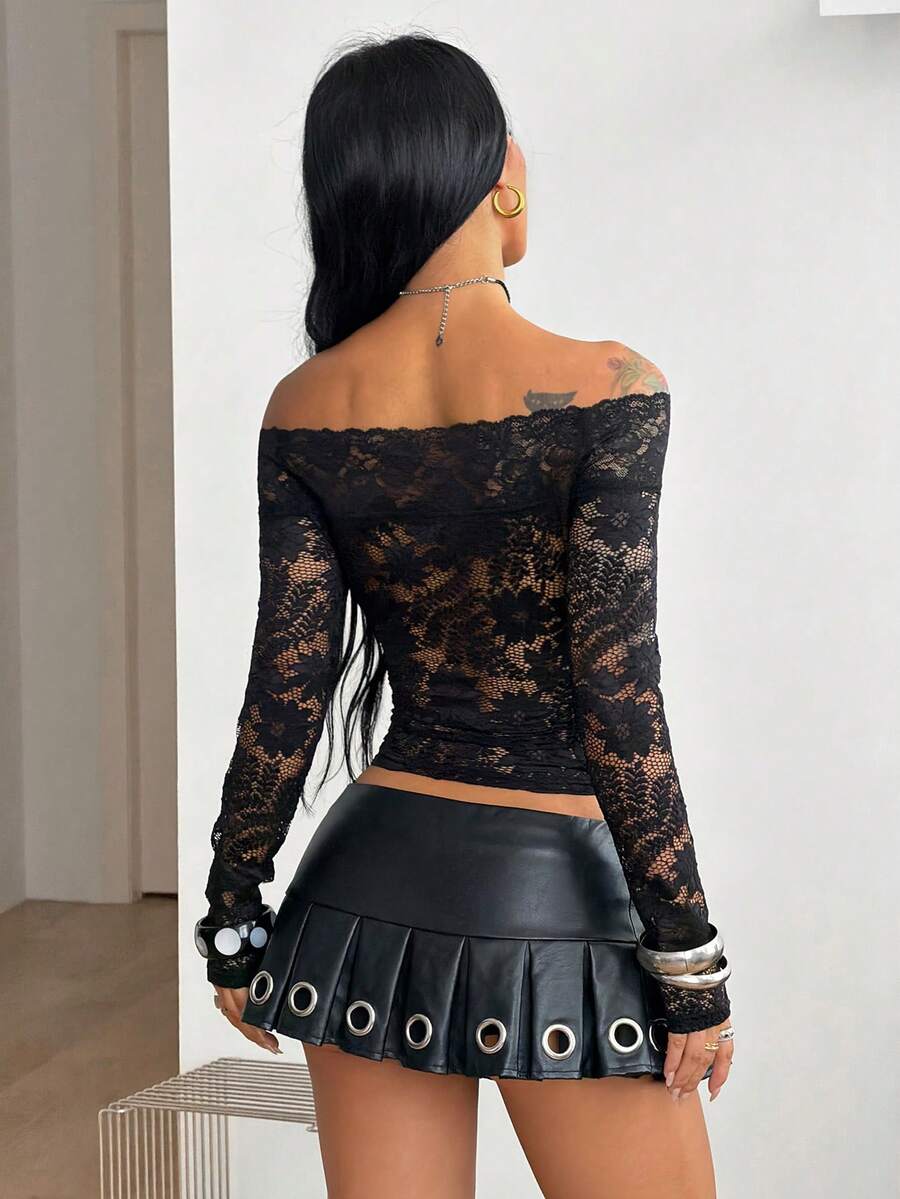 Women's slim fit off the shoulder long sleeve knitted top featuring contrast lace trim and ruched accents.