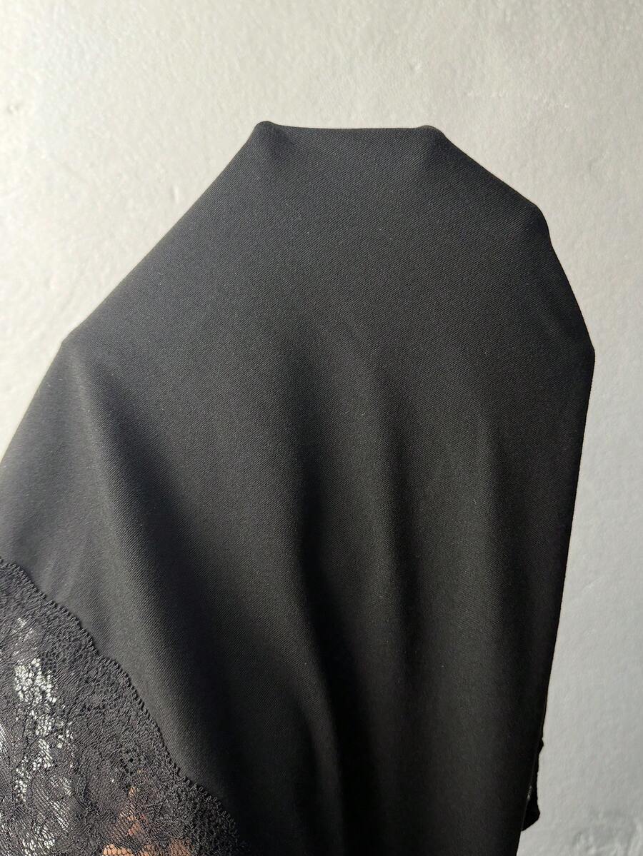 Women's slim fit off the shoulder long sleeve knitted top featuring contrast lace trim and ruched accents.