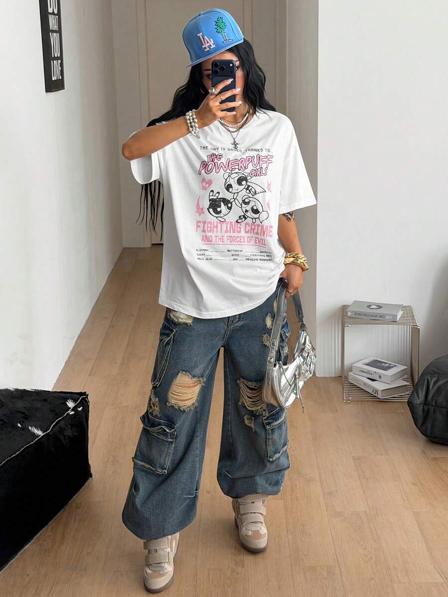 Women's oversized graphic crew neck t-shirt made of 100% white cotton knitted fabric with drop shoulder half sleeves.