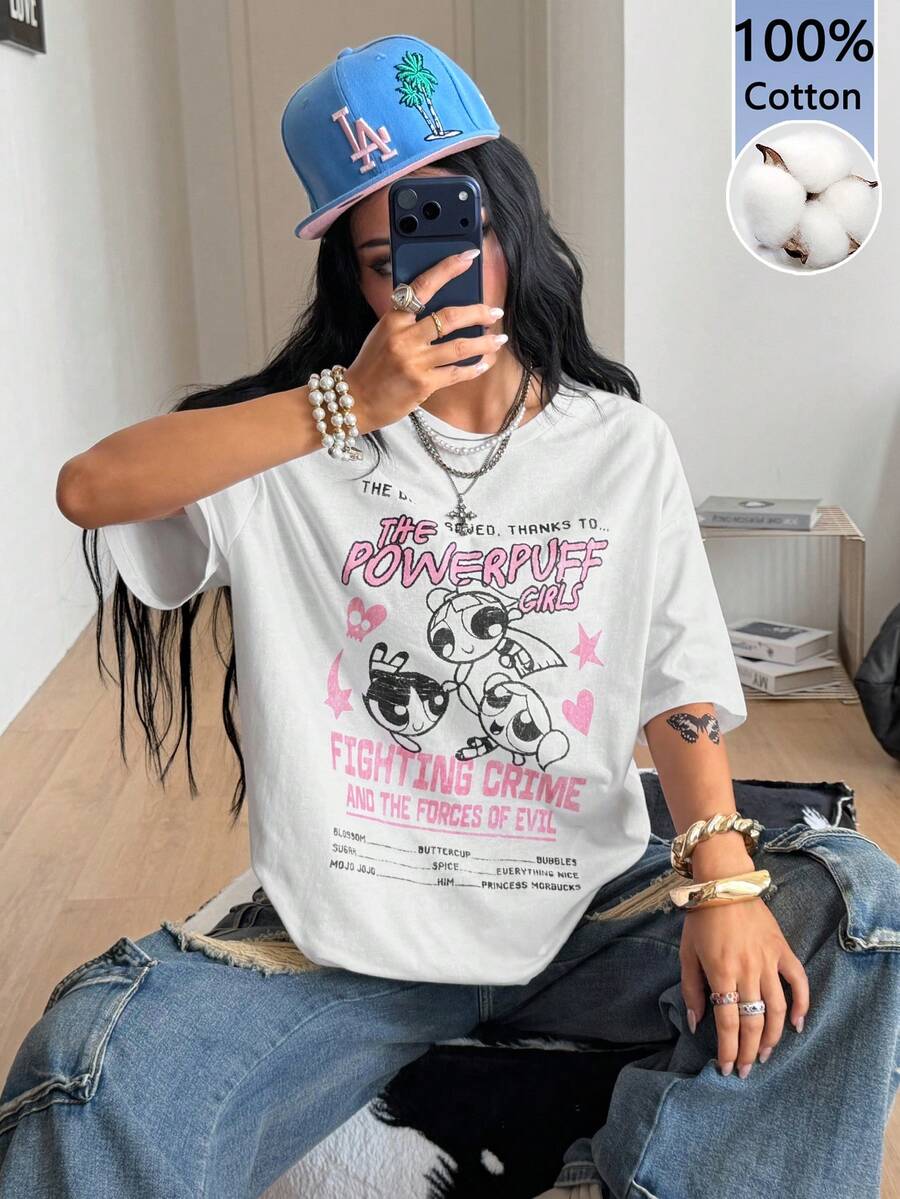 Women's oversized graphic crew neck t-shirt made of 100% white cotton knitted fabric with drop shoulder half sleeves.