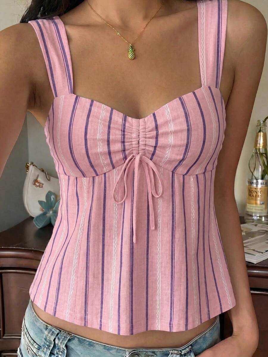 Women's striped camisole tank top with strap neckline, backless knot detail, cold shoulder styling, slim fit, and flared hem for casual vacation or daily wear.