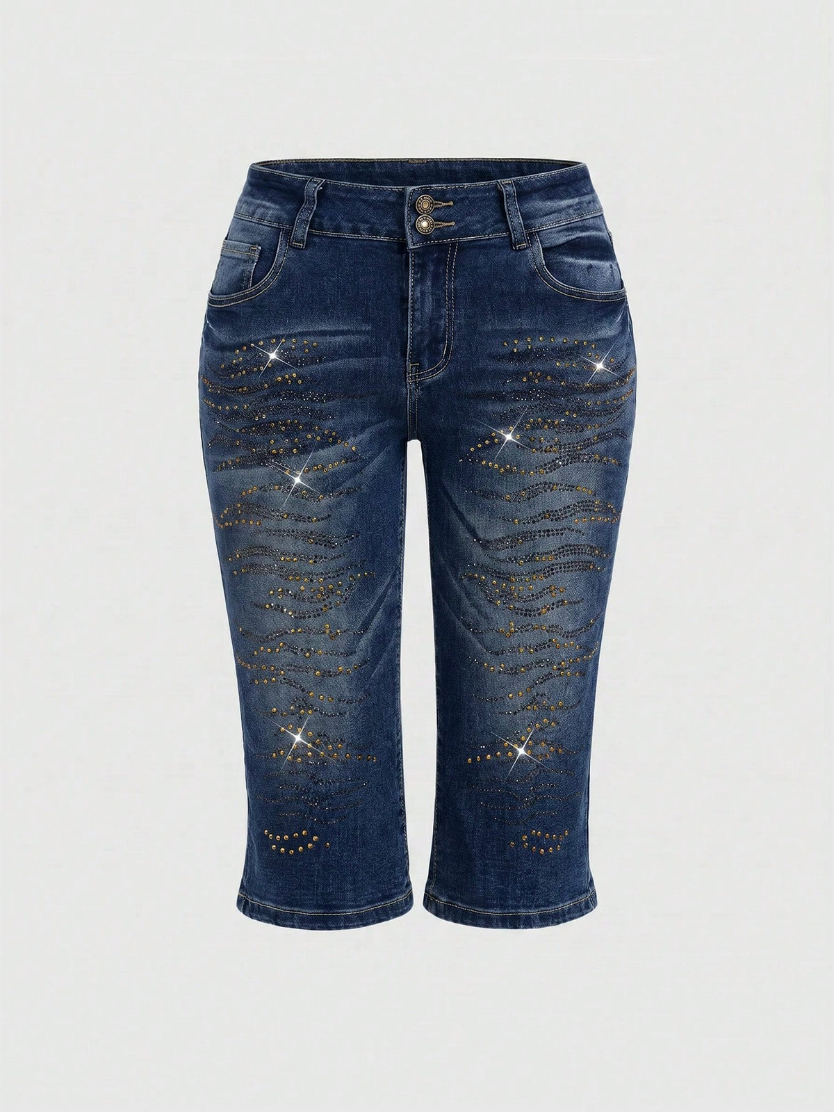Women's ultra low-rise skinny denim shorts featuring sparkling gold rhinestone embellishments with front pockets and zipper fly.