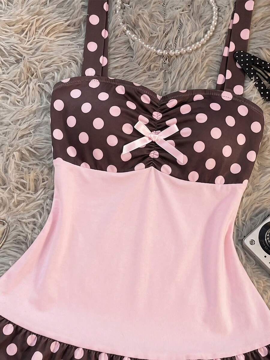Multicolor Y2K slim fit crop top with wide straps, polka dot print, ruched shirred design, bow accents, and a flared ruffle hem.