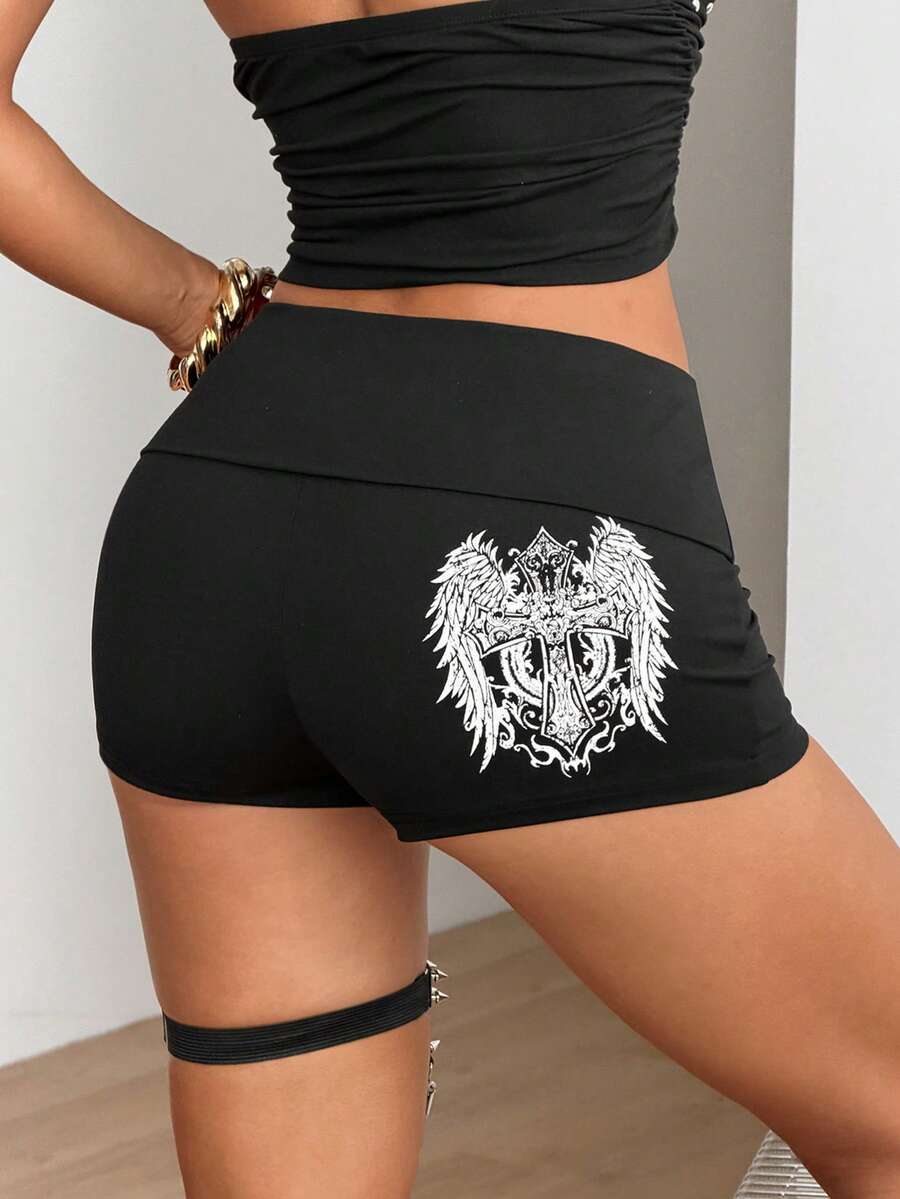 Women's black ultra low rise mini shorts with grommet eyelet and rib-knit details, zipper fly closure, skinny straight-leg fit, and plain knitted fabric.