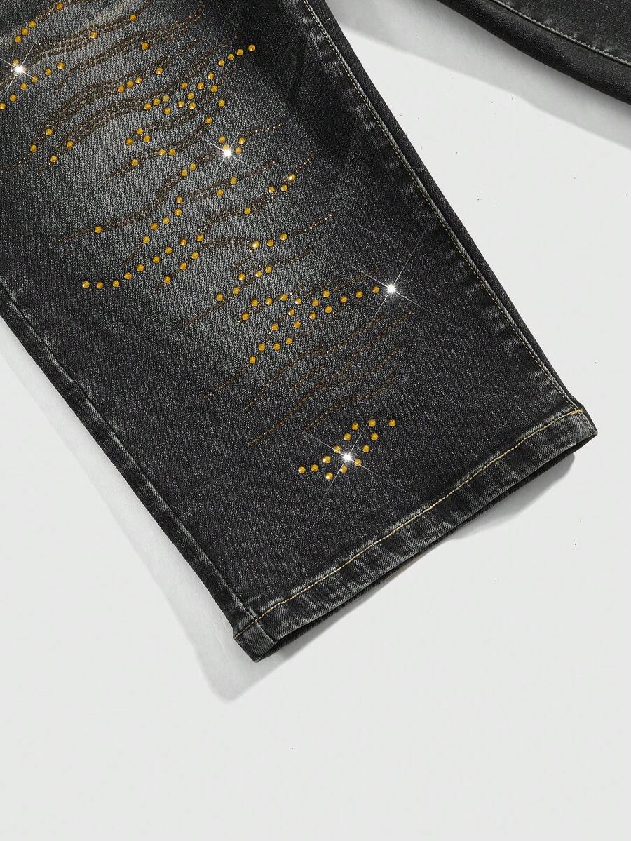 Women's ultra low-rise skinny denim shorts featuring sparkling gold rhinestone embellishments with front pockets and zipper fly.