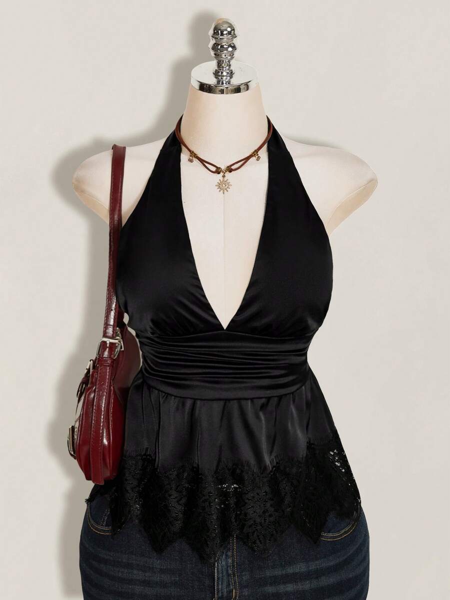 White women's deep V-neck halter tank top with ruched waist, backless design, rib-knit texture, and ruffle hem