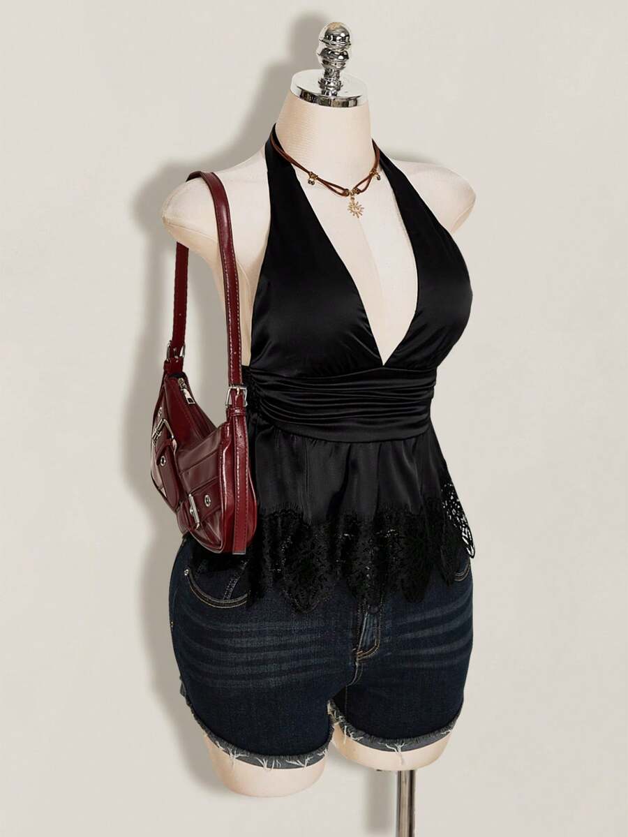 White women's deep V-neck halter tank top with ruched waist, backless design, rib-knit texture, and ruffle hem