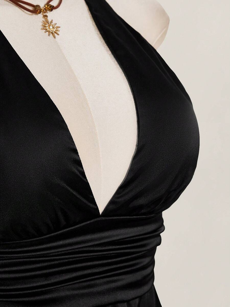 White women's deep V-neck halter tank top with ruched waist, backless design, rib-knit texture, and ruffle hem