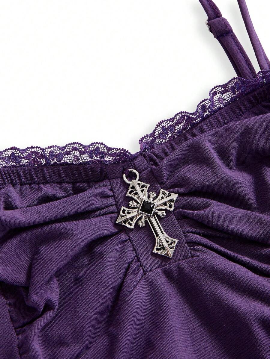 Black gothic spaghetti strap tank top for women featuring contrast lace patchwork, ruched frill details, and a cross pendant accent in a slim fit knitted fabric.