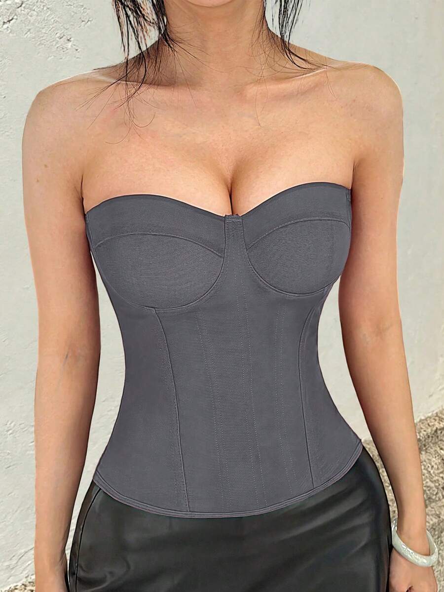 Solid color strapless corset tube top featuring a backless lace-up back design and cropped slim fit.