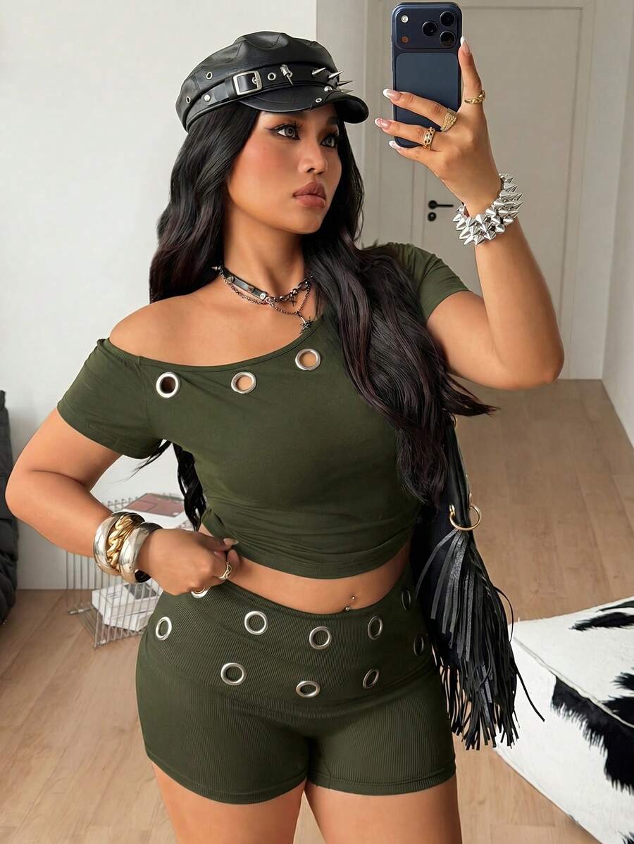 Army green women's one shoulder short sleeve crop t-shirt featuring asymmetrical grommet eyelet details.
