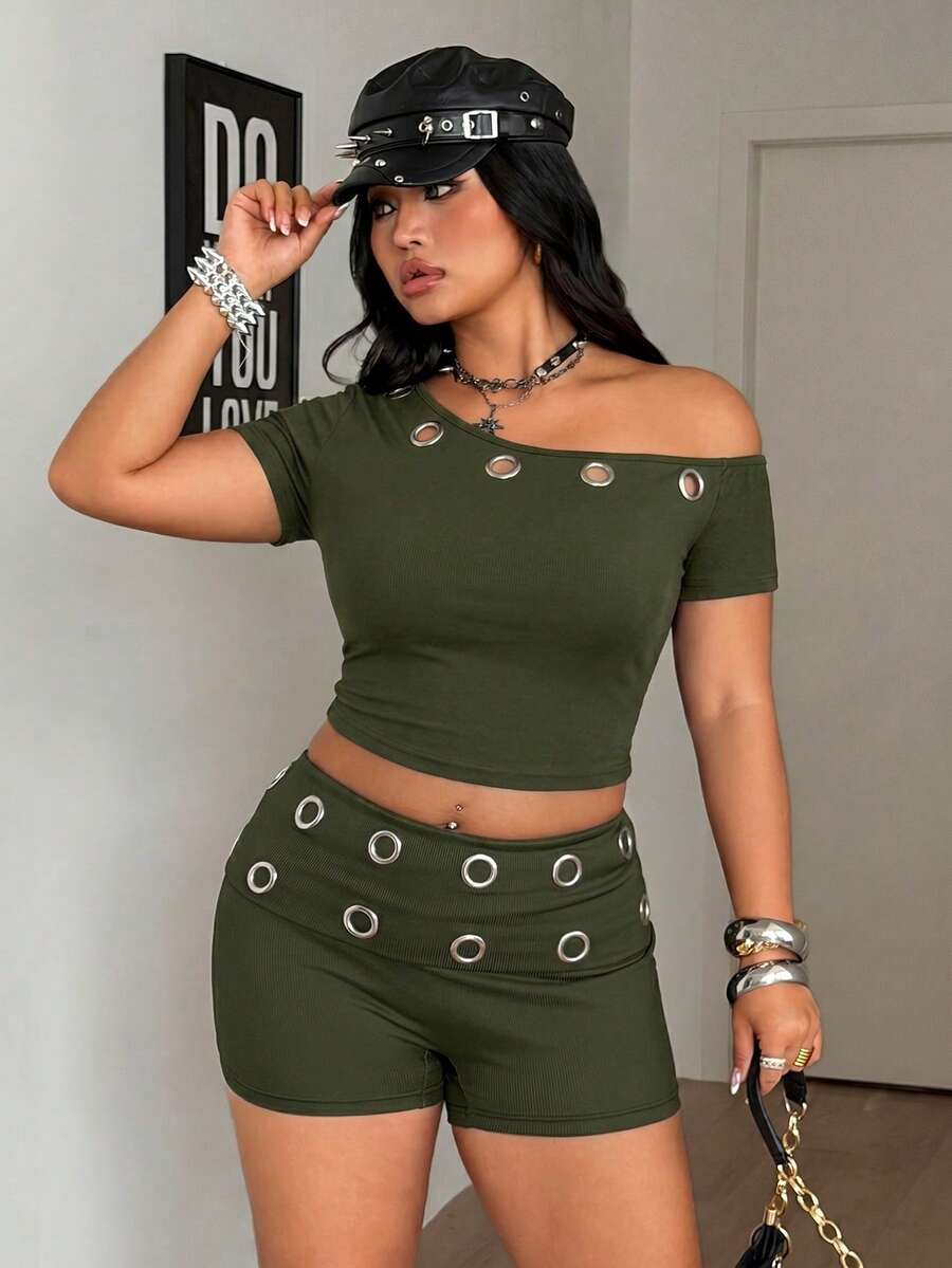 Army green women's one shoulder short sleeve crop t-shirt featuring asymmetrical grommet eyelet details.