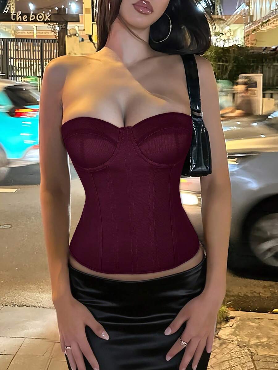 Solid color strapless corset tube top featuring a backless lace-up back design and cropped slim fit.