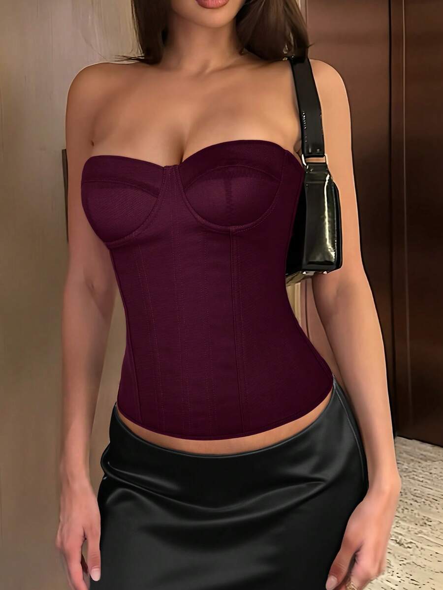 Solid color strapless corset tube top featuring a backless lace-up back design and cropped slim fit.