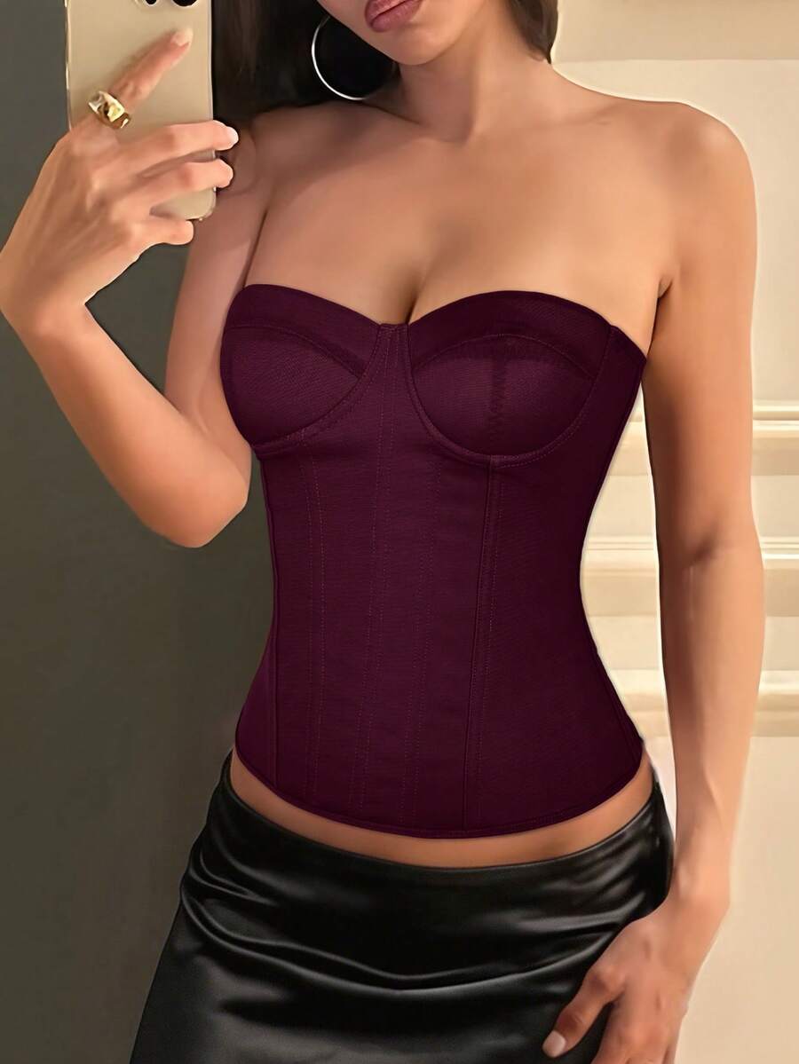 Solid color strapless corset tube top featuring a backless lace-up back design and cropped slim fit.