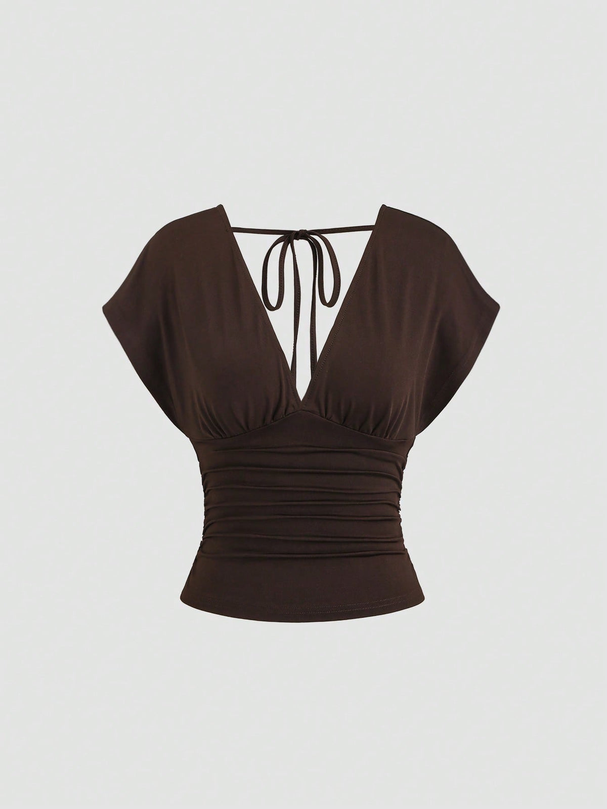 Women's black knitted t-shirt featuring a reversible deep v-neckline, batwing cap sleeves, ruched detailing, and a slim fit waist.