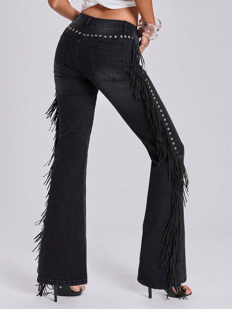 Women's ultra low waist flare jeans in washed stretch denim featuring an extra long bootcut leg and zipper fly closure.