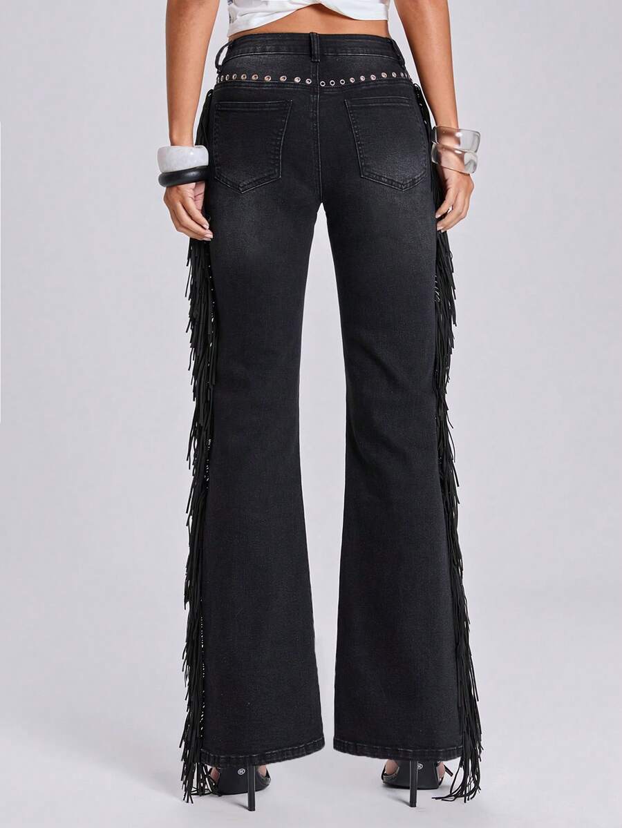 Women's ultra low waist flare jeans in washed stretch denim featuring an extra long bootcut leg and zipper fly closure.