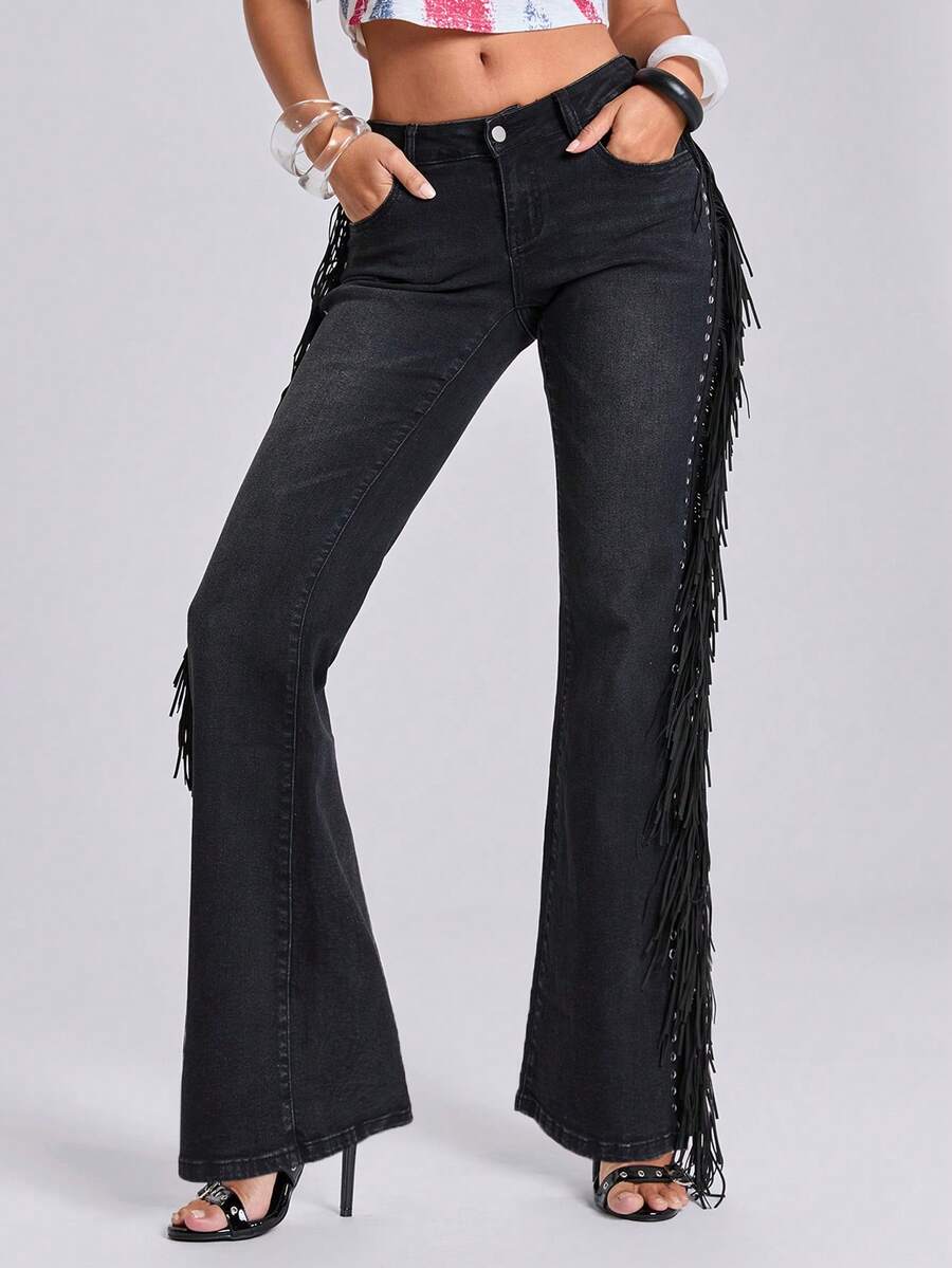 Women's ultra low waist flare jeans in washed stretch denim featuring an extra long bootcut leg and zipper fly closure.