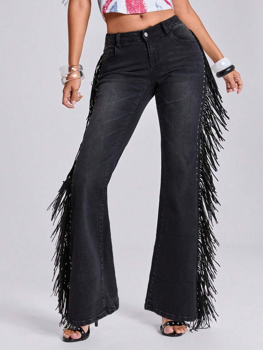 Women's ultra low waist flare jeans in washed stretch denim featuring an extra long bootcut leg and zipper fly closure.