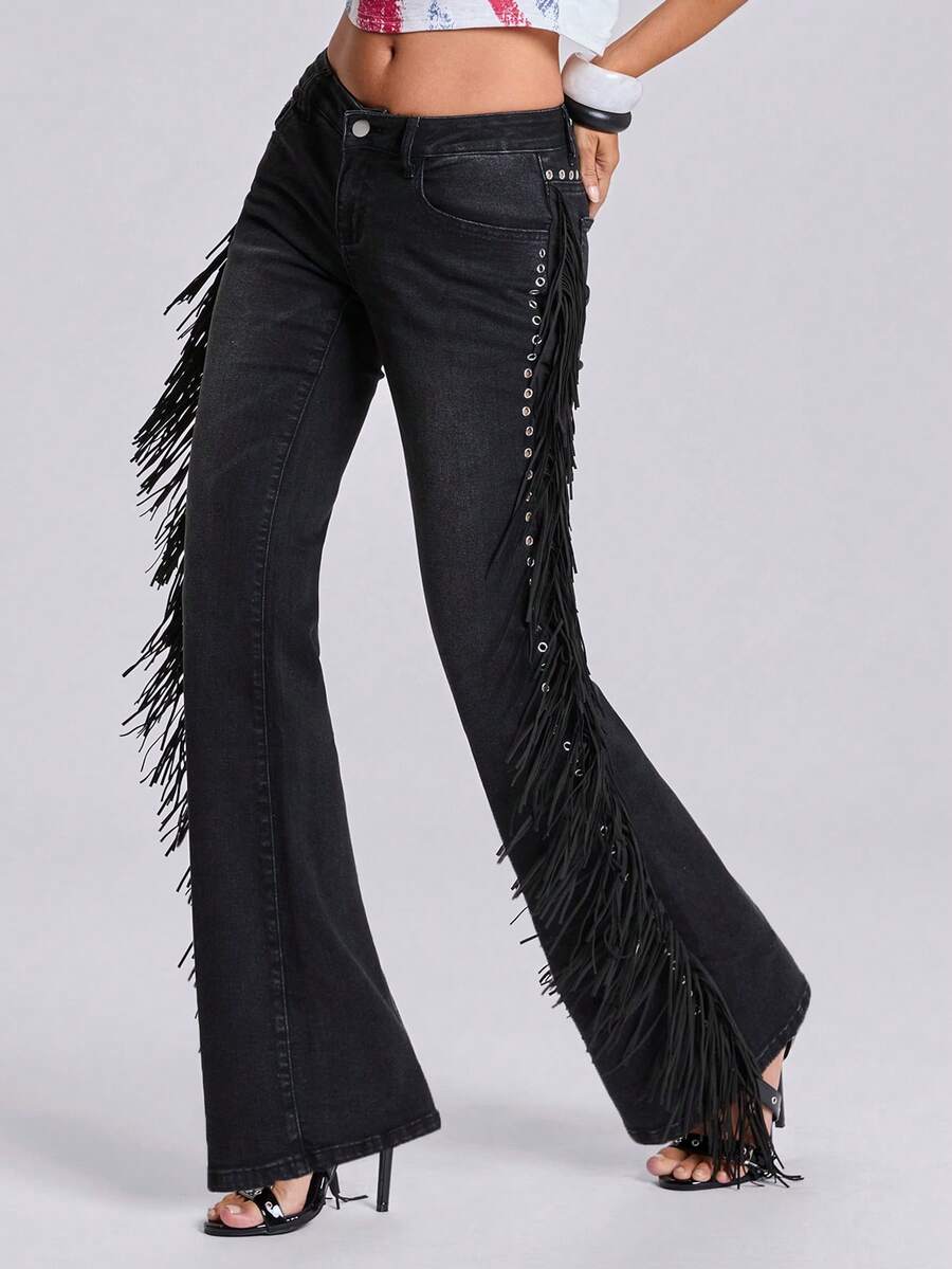 Women's ultra low waist flare jeans in washed stretch denim featuring an extra long bootcut leg and zipper fly closure.