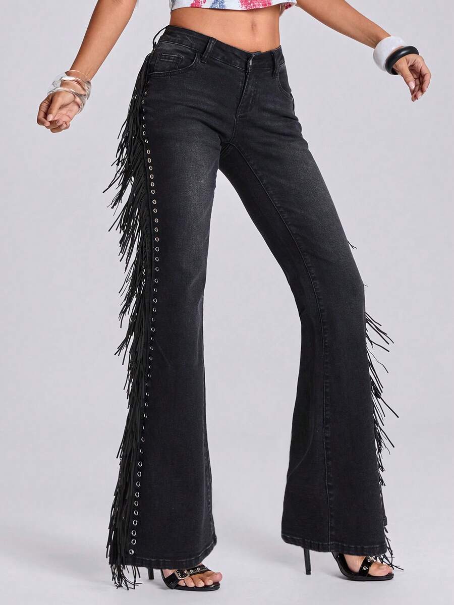 Women's ultra low waist flare jeans in washed stretch denim featuring an extra long bootcut leg and zipper fly closure.