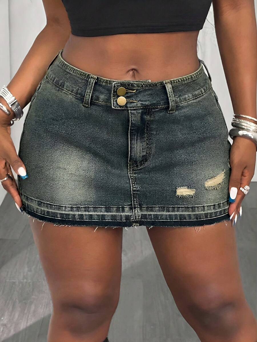 Women's black low waist bodycon mini skirt with button detail, pockets, and zipper closure