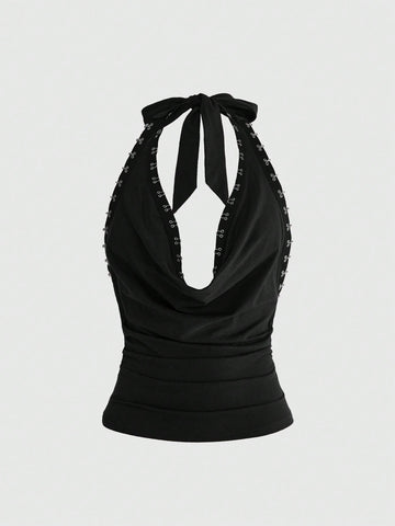Women's black draped halter neck tank top featuring a slim fit, crafted from high-stretch knitted fabric.