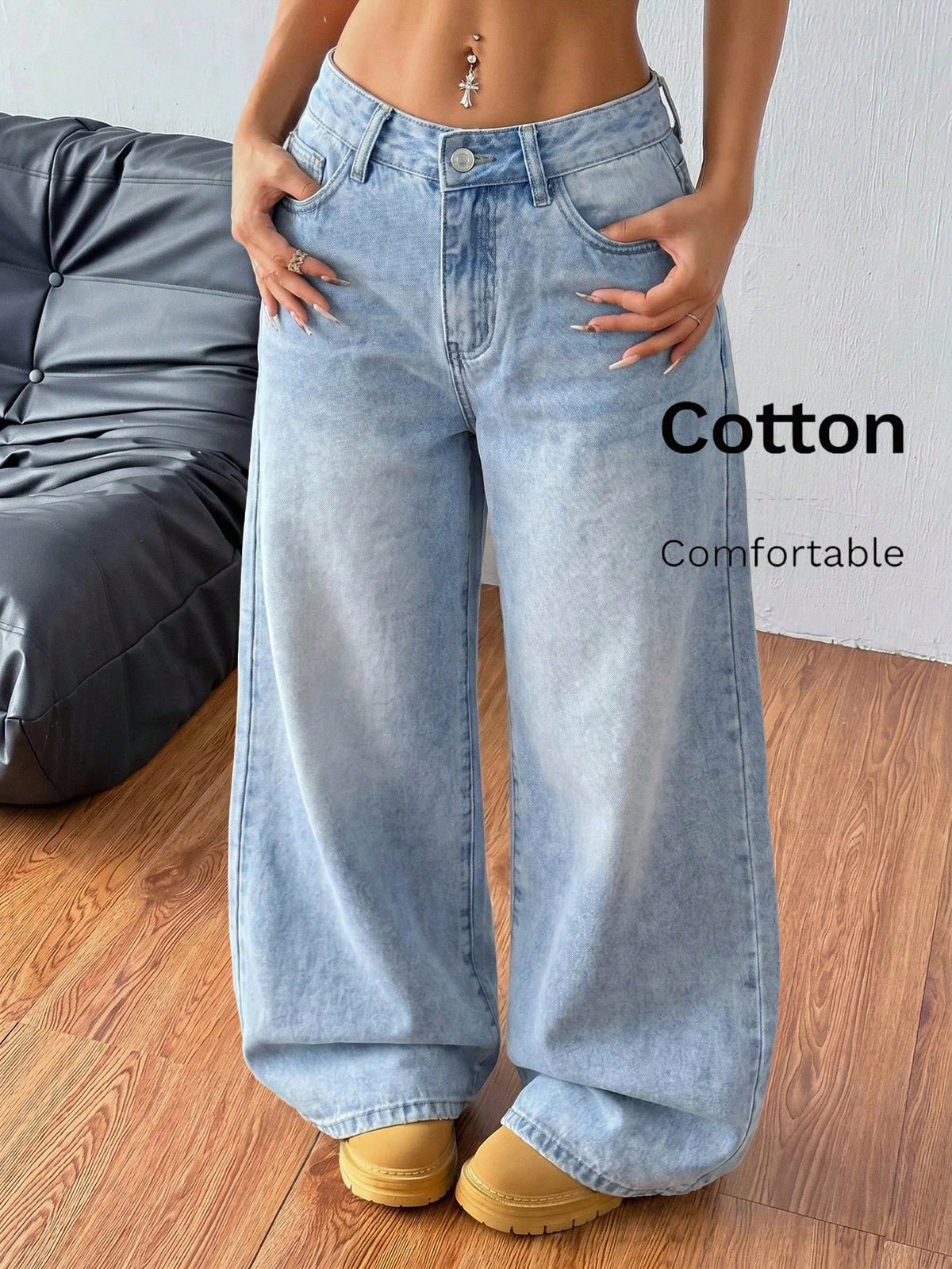 Women's loose wide-leg jeans in light wash denim with low waist and extra-long relaxed fit