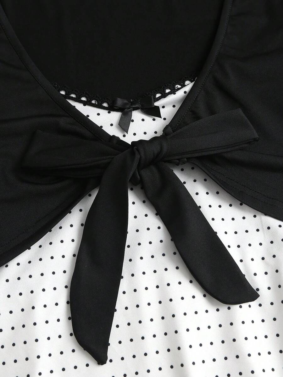 Women's 2-in-1 polka dot short sleeve layering cardigan T-shirt with a Queen Anne neckline and tie-front bow detail.