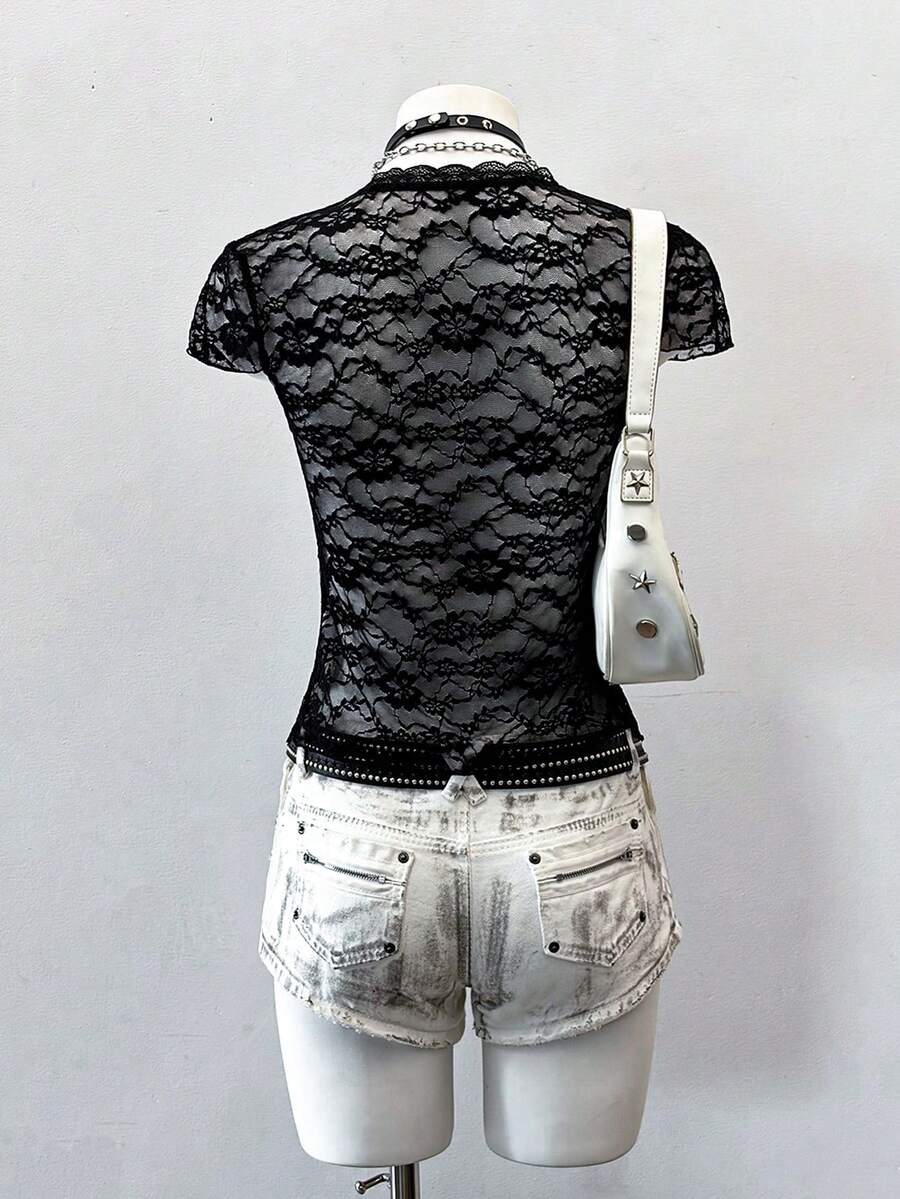 Women's semi-sheer deep V-neck top featuring cap sleeves, contrast lace trimming, and a lace-up front detail.