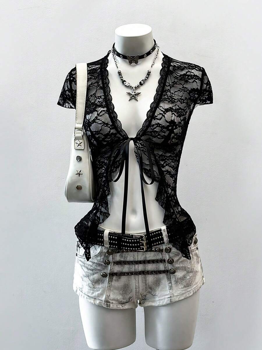 Women's semi-sheer deep V-neck top featuring cap sleeves, contrast lace trimming, and a lace-up front detail.