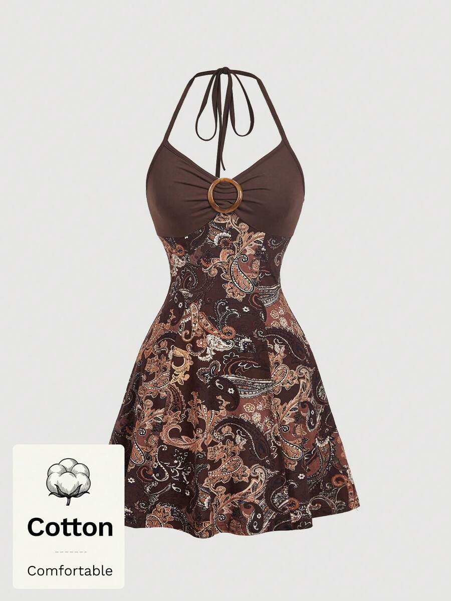 Women's apricot halter mini dress with backless knot and ring detail, sleeveless cami style, flared hem, and boho vacation look